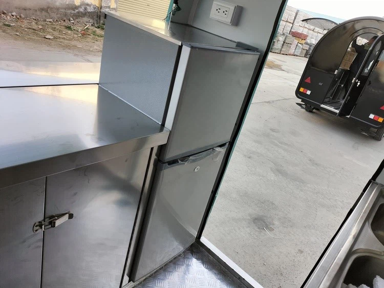 breakfast food truck equipped with a commercial fridge