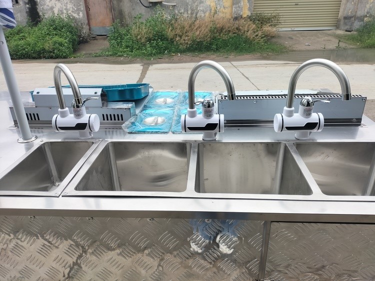 3 compartment water sink and a hand sink